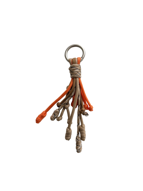 Keychain with braided rope design on a white background